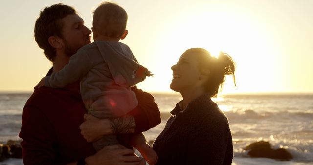 Cheerful Family Enjoying Sunset Beach - Download Free Stock Images Pikwizard.com