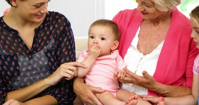 Three Generations Bonding with Adorable Baby Girl on Family Visit - Download Free Stock Images Pikwizard.com