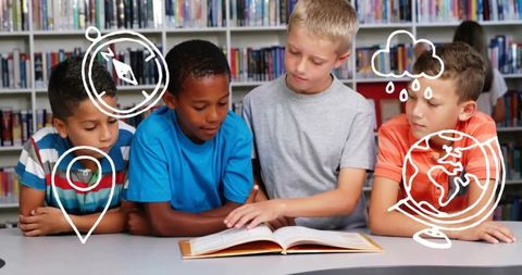 Elementary students reading together in library with peer tutor guiding through open book