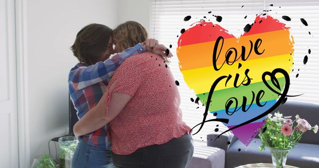 Image of rainbow heart and love is love over lesbian couple embracing at home - Download Free Stock Photos Pikwizard.com