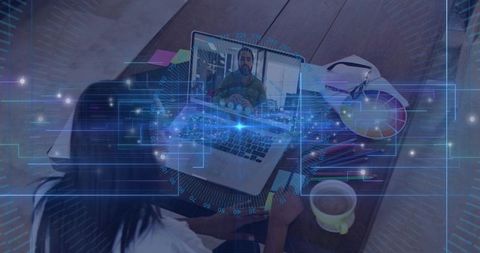 Remote worker interacting with holographic interface for cybersecurity collaboration