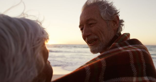 Elderly Couple Enjoying Sunset at Beach - Download Free Stock Images Pikwizard.com