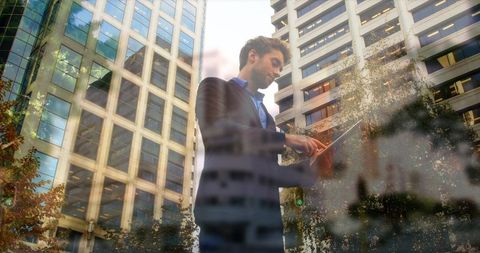 Businessman Using Tablet Amidst Urban Timelapse