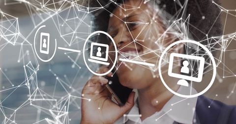 Businesswoman using smartphone with digital interface
