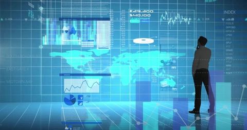 Businessman Analyzing Financial Data on Transparent Screens - Download Free Stock Images Pikwizard.com