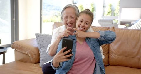 Grandmother and Granddaughter Cherishing Moments with Selfie