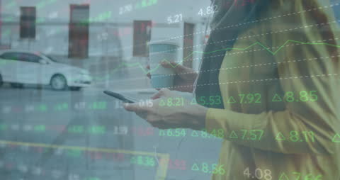 Businesswoman Walking with Coffee Analyzing Stock Market Display
