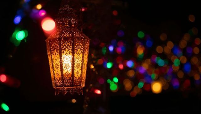 Ornate moroccan lantern hanging, casting warm amber glow with colorful bokeh lights