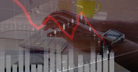 Financial data analysis on laptop with digital charts overlay