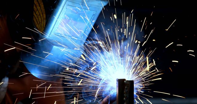 Welder at Work Creating Bright Sparks in Workshop - Download Free Stock Images Pikwizard.com