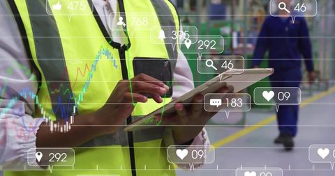 Warehouse Supervisor Tapping Tablet Monitoring Inventory Analytics and Operational Data