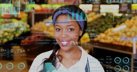 Smiling Produce Associate Presenting Digital Analytics Overlay in Grocery Market