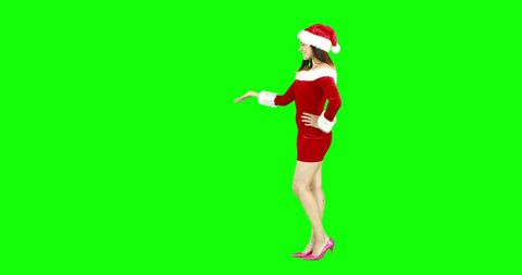 Woman in Santa Attire Making Holiday Greeting Enthusiastic Mood