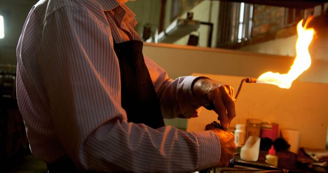 Glassblower Using Torch in Workshop - Download Free Stock Images Pikwizard.com