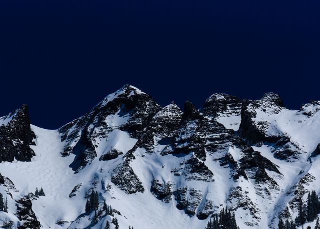 Snow Covered Mountain Peak against Clear Blue Sky - Download Free Stock Photos Pikwizard.com