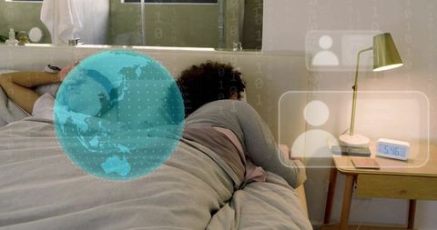 Couple sharing bed in cozy minimalist bedroom featuring cyan globe digital overlay