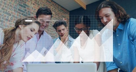 Team Reviewing Data around Laptop with Graph Overlay