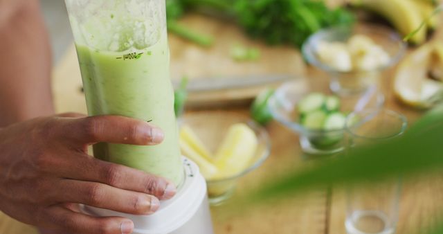 Hand Making Fresh Green Smoothie in Blender - Download Free Stock Images Pikwizard.com