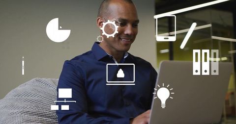 Business Professional Typing on Laptop with Digital Technology Icons