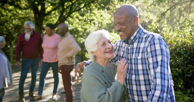 Multiracial Senior Friends Hugging and Connecting in Park - Download Free Stock Images Pikwizard.com