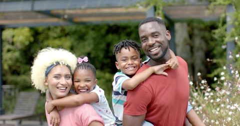 Happy Diverse Family Enjoying Quality Time Together Outdoors