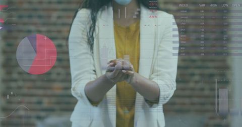 Businesswoman Analyzing Data with Smartphone and Digital Graphs