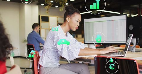 Technology-driven Businesswoman Analyzing Data in Modern Office