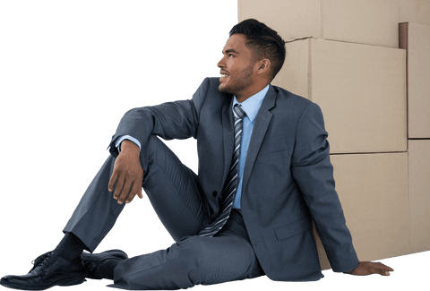 Smiling Businessman Sitting with Cardboard Boxes Transparent - Download Free Stock Videos Pikwizard.com