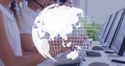 Global customer support team working at call center with headsets and wireframe globe