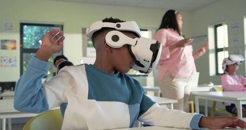 African American Students Using VR Headsets in Classroom for Immersive STEM Learning