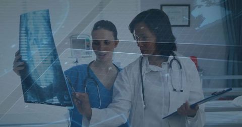 Healthcare Professionals Analyzing X-Ray in Hospital Exam Room