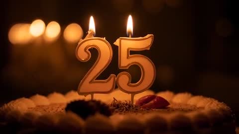 Loopable Flickering Number 25 Candles Burning on Frosted Celebration Cake with Bokeh