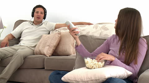 Couple Relaxing at Home with Different Activities