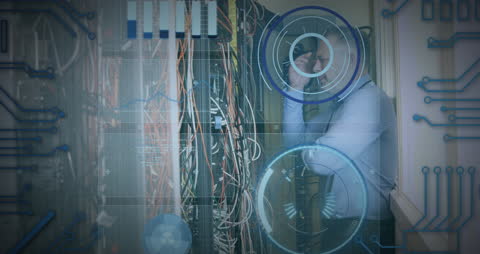 Engineer Troubleshooting Server Network Cables in Data Center