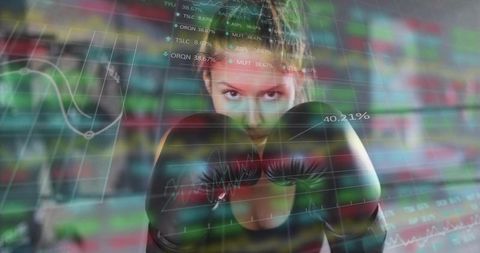 Female boxer confronting financial markets with data overlays and trading concept
