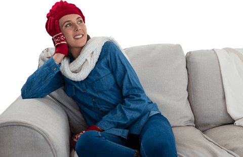 woman in red hat relaxing on sofa with winter vibes transparent - Download Free Stock Videos Pikwizard.com