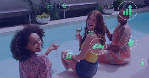 Friends Enjoying Wine by Tranquil Poolside Deck