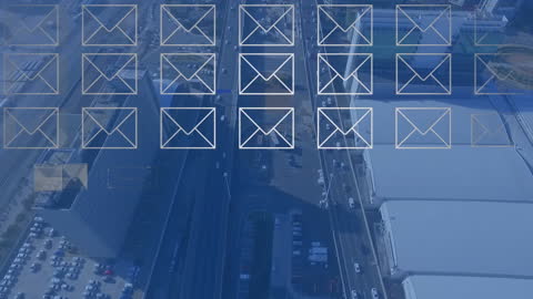 Overhead view of city streets with digital envelope icons representing email communication and data transfer. Suitable for use in presentations on technology and business communication, illustrating the concept of digital connectivity in urban environments.