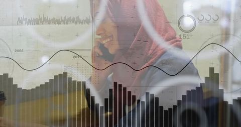 Businesswoman Analyzing Data Charts in Modern Cafe