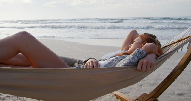 Young Woman Relaxing on Hammock by Beach during Sunset - Download Free Stock Images Pikwizard.com