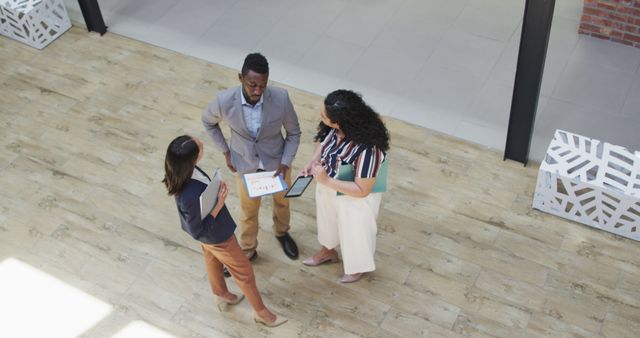 Top View of Business Team Discussing Project in Modern Office - Download Free Stock Images Pikwizard.com