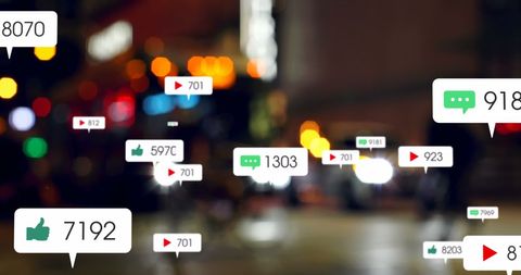 Social Media Engagement Icons Against City Lights