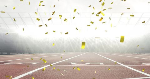 Golden Confetti Falling on Race Track During Celebration - Download Free Stock Images Pikwizard.com