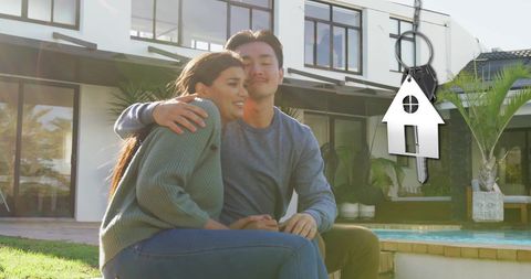 Happy Couple Enjoying New Home Ownership in Outdoor Space