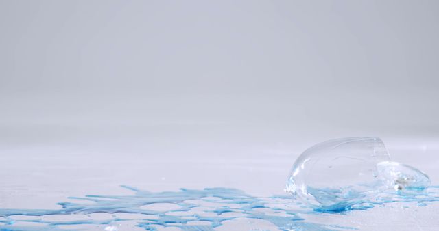 Close-Up of Spilled Water from Glass on Table - Download Free Stock Images Pikwizard.com