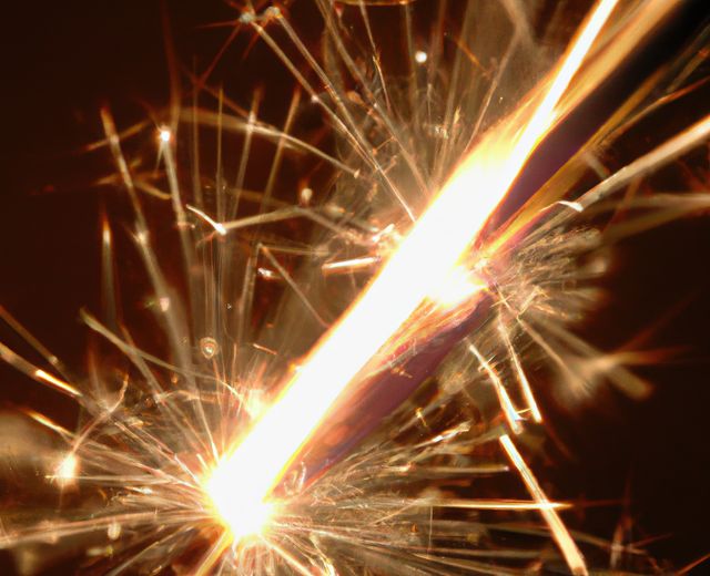 Close-Up Shot of Sparkler Fireworks Lighting Up the Night - Download Free Stock Images Pikwizard.com