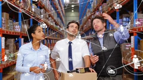 Warehouse Team Discussing Logistics with Digital Networks Overlay