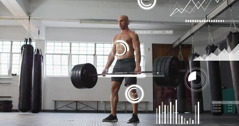 Bald Athlete Performing Deadlift in Industrial Gym with Real-Time Fitness HUD Display