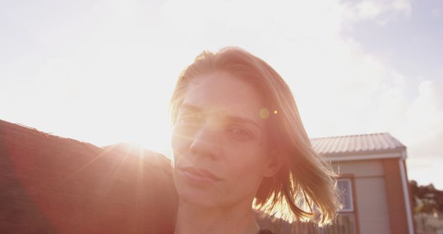 Contemplative Woman in Warm Sunset Light at Countryside - Download Free Stock Images Pikwizard.com