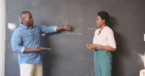 Business Professionals Discussing Growth Charts in Office Meeting - Download Free Stock Images Pikwizard.com